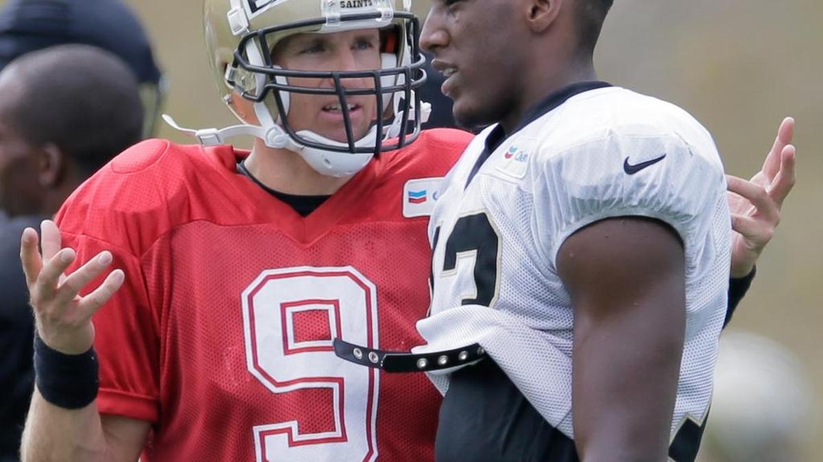 New Orleans Saints quarterback Drew Brees (9) chats with wide receiver Michael Thomas (13) during NFL football training camp, Wednesday in White Sulphur Springs, W.Va.,