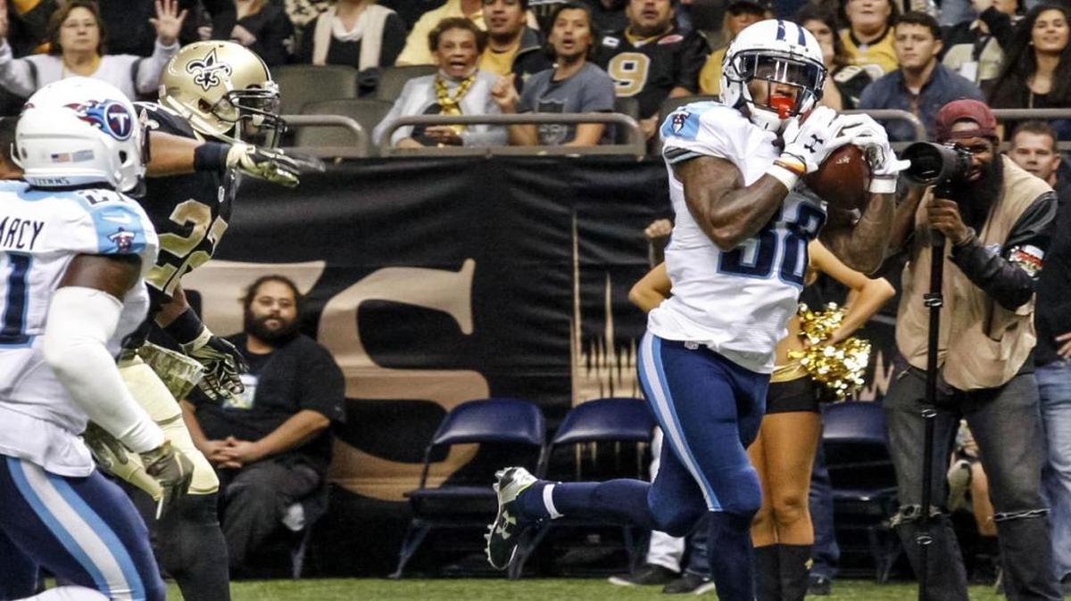 Tennessee Titans' B.W. Webb intercepts a pass intended for New Orleans Saints running back Mark Ingram (22) during a Nov. 8, 2015, game in New Orleans. Webb is joining the Saints' secondary to fill the void left by an injured Delvin Breaux.