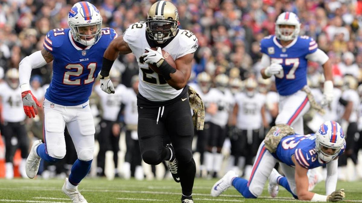 New Orleans Saints' Mark Ingram (22) rushes past Buffalo Bills' Jordan Poyer (21) and Micah Hyde (23). A few weeks ago, New Orleans' first visit to LA since the 1990s seemed highly unlikely to be a meeting of division leaders. But with standout seasons from running backs Ingram and Todd Gurley, the Rams (7-3) and the Saints (8-2) are two of the NFL's most pleasant surprises.