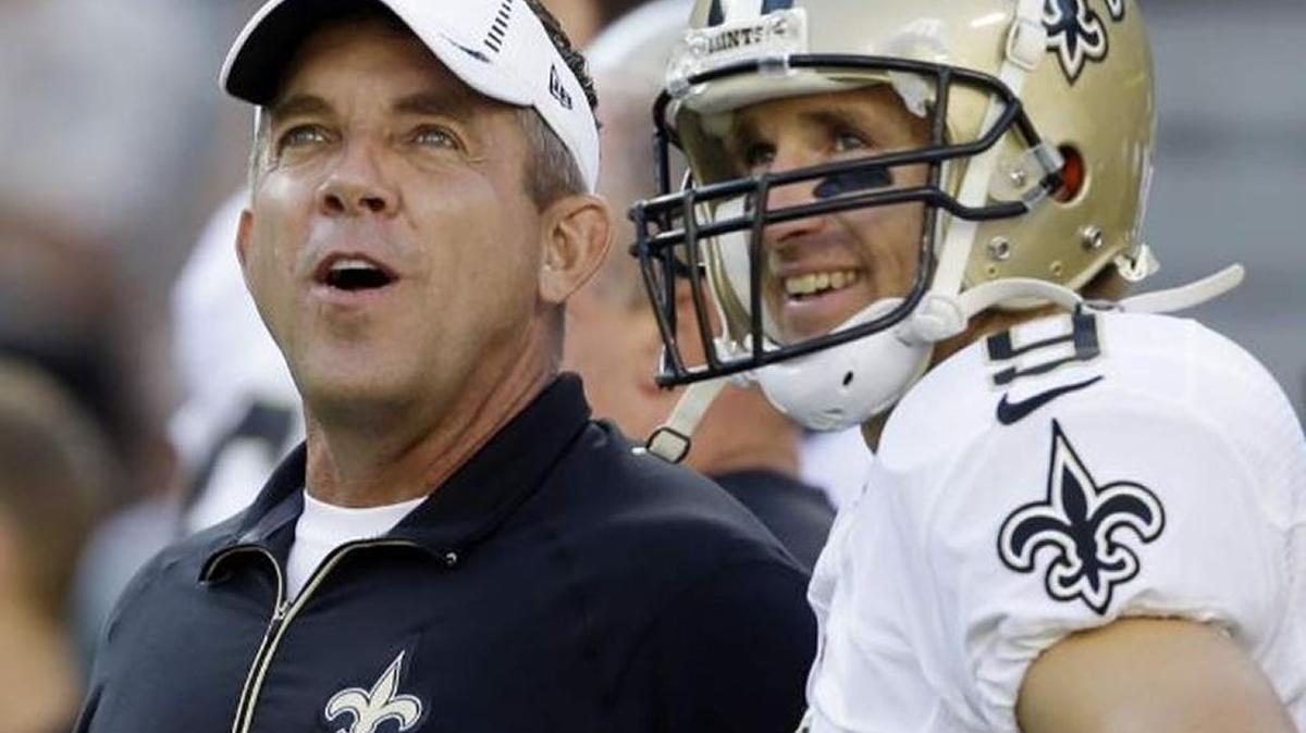 New Orleans Saints head coach Sean Payton talks to quarterback Drew Brees during a preseason game in 2015. The pair will head into their 11th season together when training camp starts July 27.