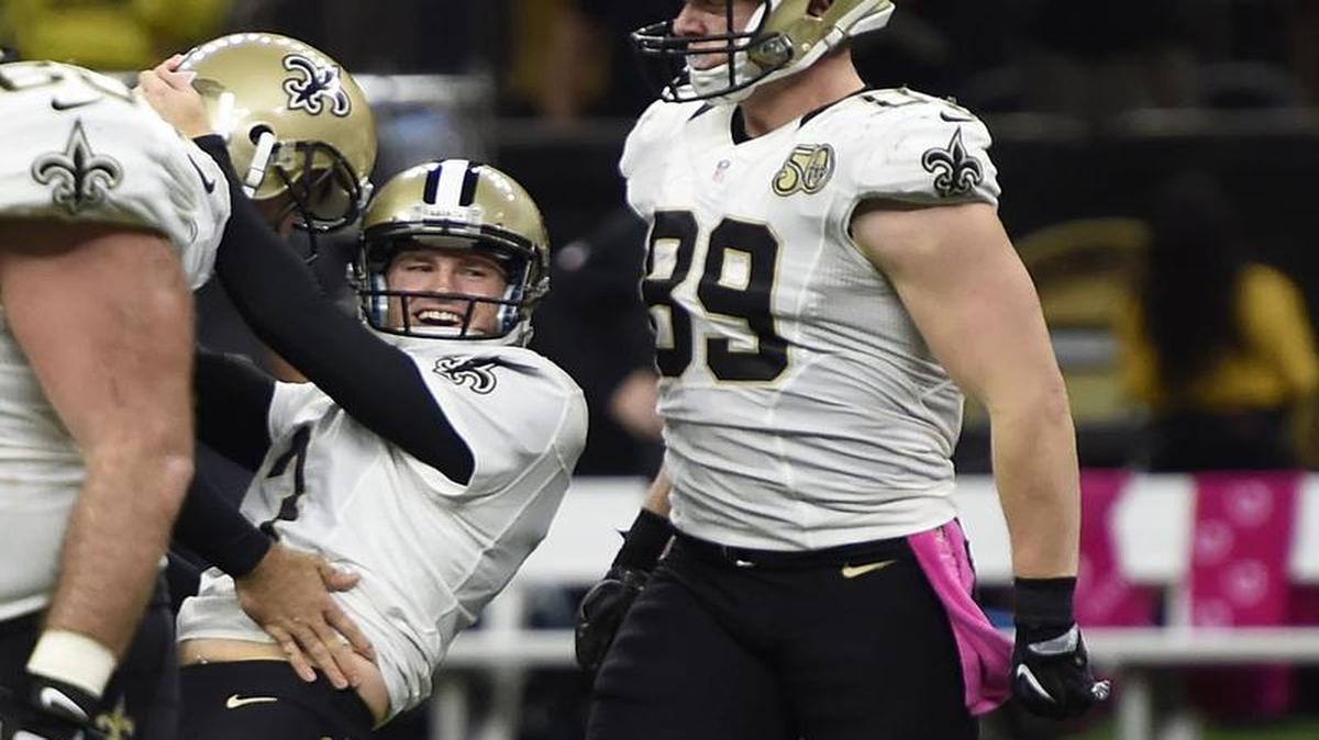 New Orleans Saints kicker Wil Lutz (3) celebrates with teammates after kicking the game winning field goal in the second half of an NFL football game against the Carolina Panthers in New Orleans, Sunday. The Saints won 41-38.