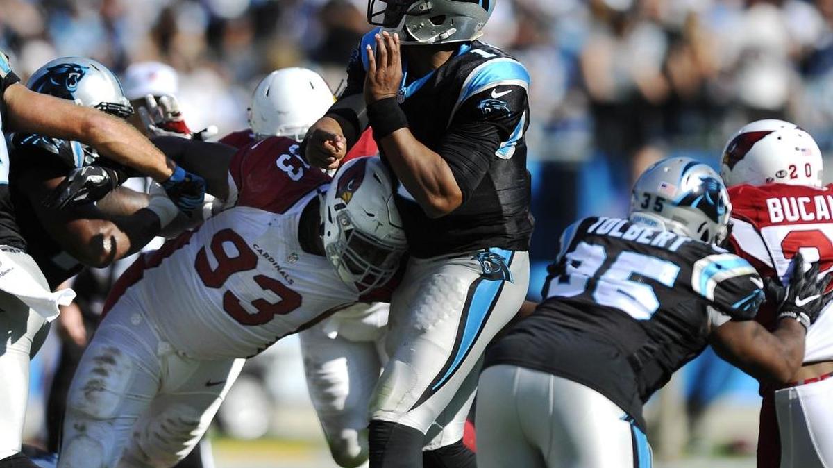 Carolina Panthers quarterback Cam Newton (1) gets hit by Arizona Cardinals defensive end Calais Campbell (93) on Oct. 30 at Bank of America Stadium in Charlotte, N.C. Campbell could be a free agency target of the New Orleans Saints.