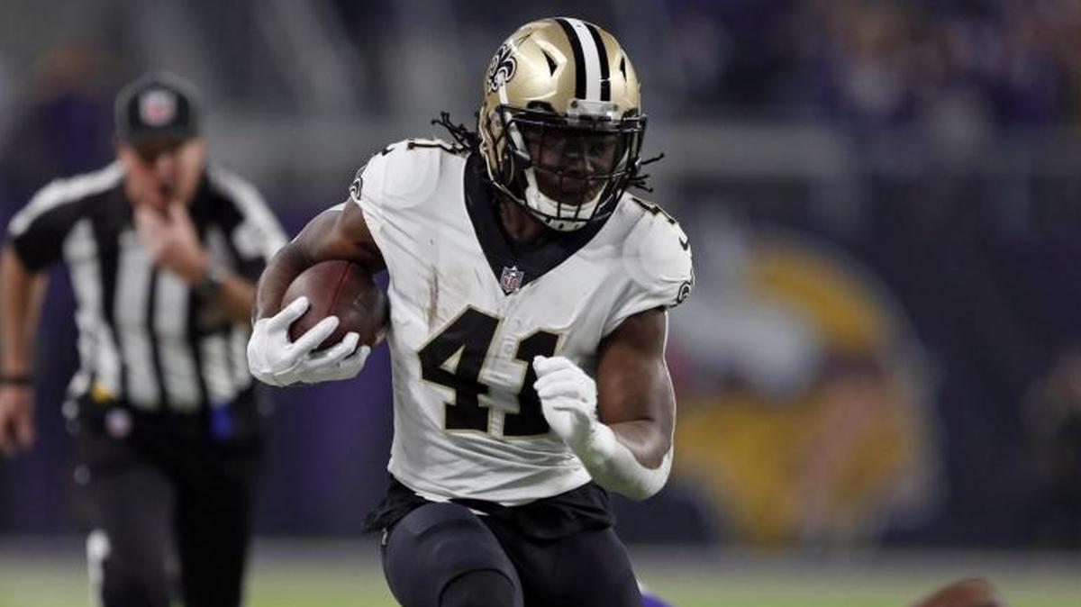 New Orleans Saints running back Alvin Kamara (41) runs after getting past Minnesota Vikings cornerback Xavier Rhodes (29) during the first half of an NFL divisional football playoff game in Minneapolis on Jan. 14.