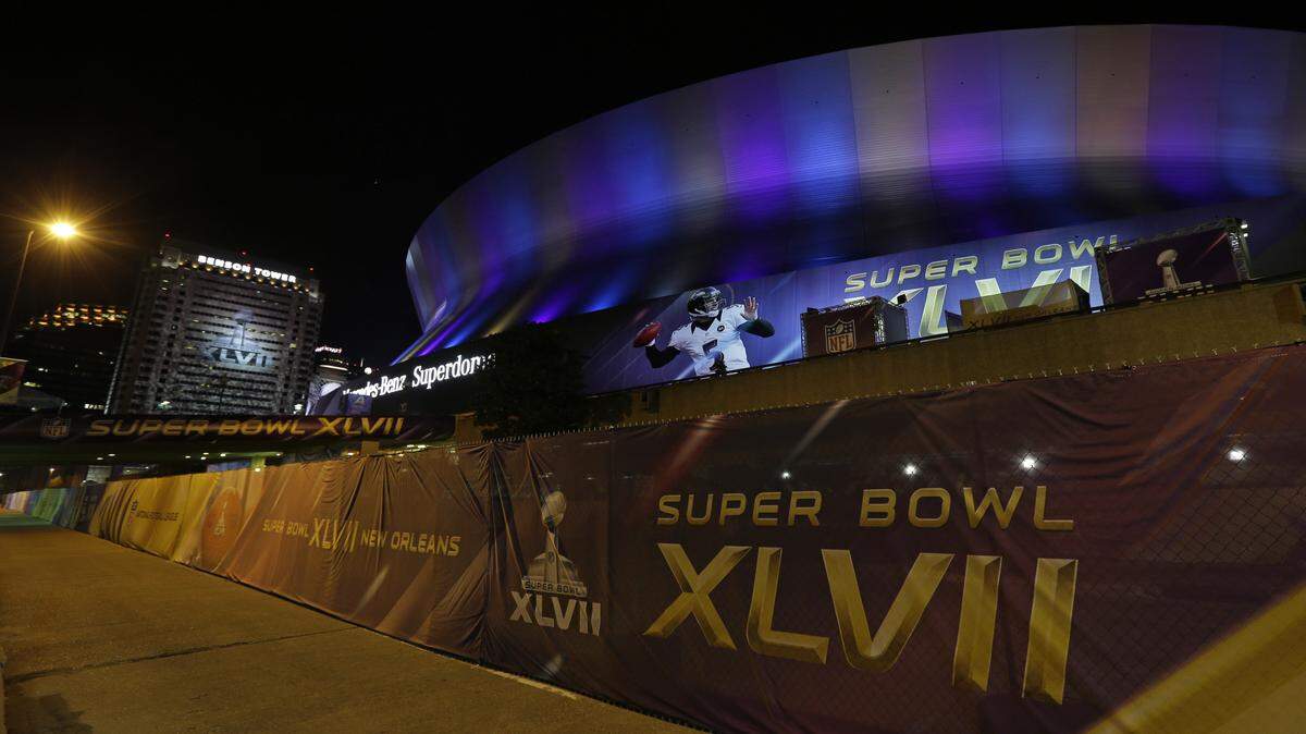 The Mercedes Benz Superdome is pictured in New Orleans on Friday, Feb. 1, 2013. The Baltimore Ravens will face the San Francisco 49ers in Superbowl XLVII on Sunday. (AP Photo/Dave Martin)