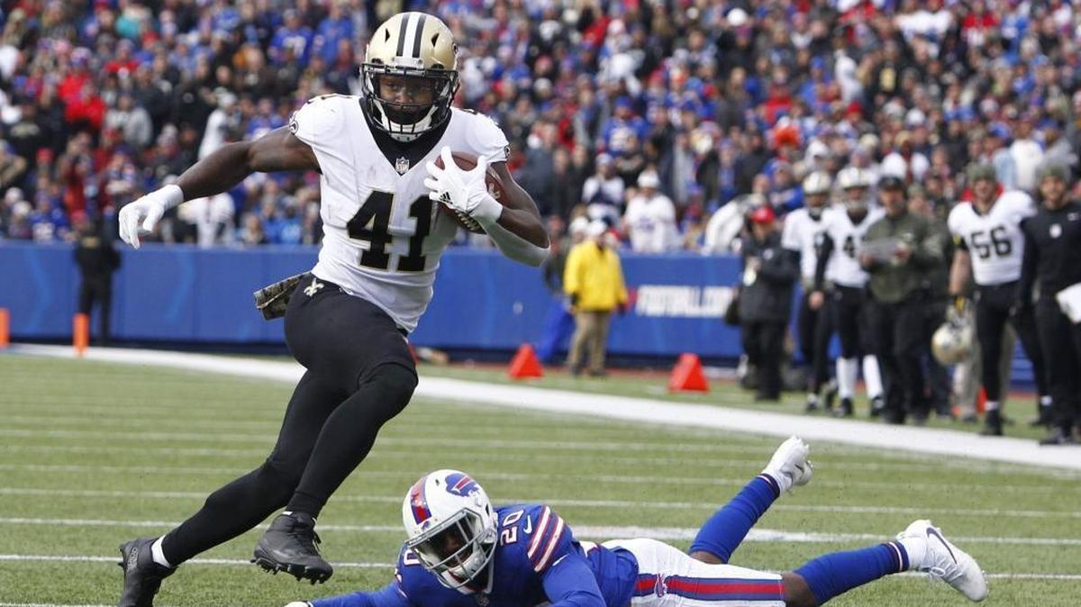 New Orleans Saints running back Alvin Kamara (41) rushes past Buffalo Bills' Shareece Wright (20) during the first half of an NFL football game Sunday, Nov. 12, 2017, in Orchard Park, N.Y.