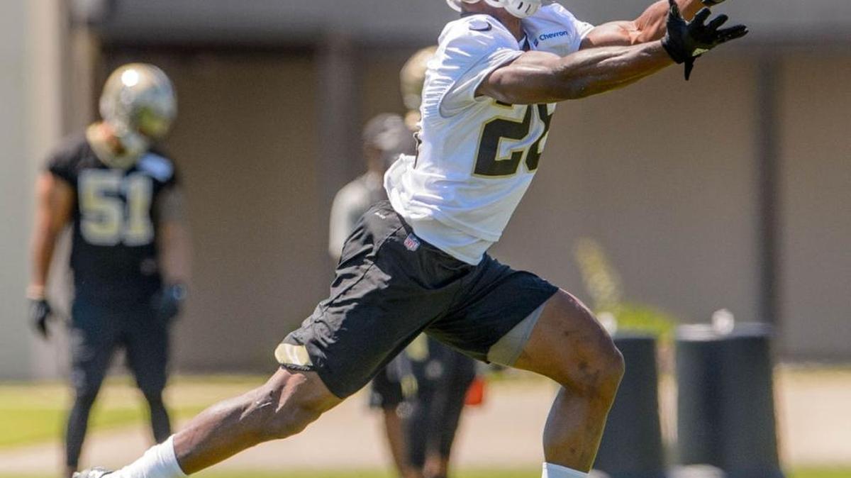 New Orleans Saints running back Adrian Peterson makes a catch during the Saints' organized team activities on Thursday in Metairie, Louisiana.