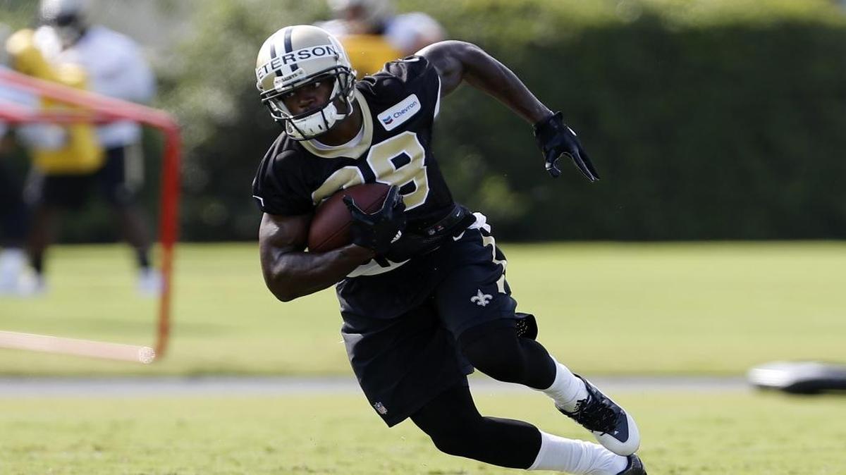New Orleans Saints running back Adrian Peterson (28) is still waiting to show off the renowned physical aspect of his game with his new team because there has been only minimal tackling allowed at Saints training camp so far.