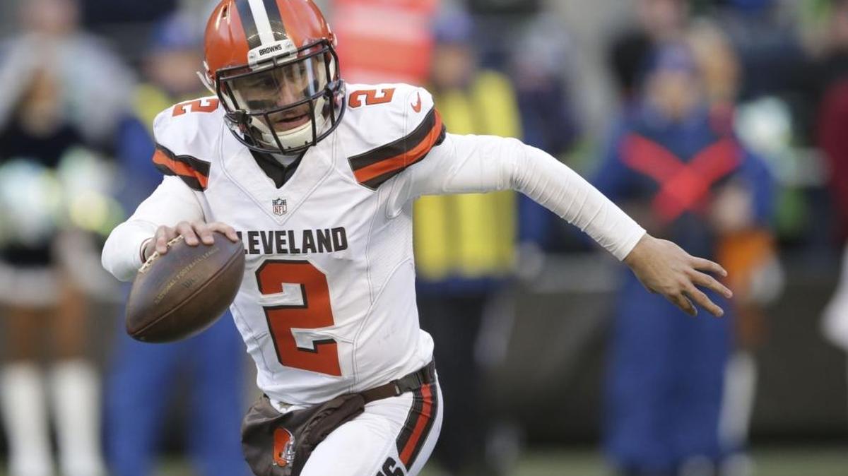 Cleveland Browns quarterback Johnny Manziel looks to pass against the Seattle Seahawks in the second half of an NFL football game in Seattle. Johnny Manziel has spoken with Sean Payton, according to an NFL Network report. Could Johnny Football end up in the Big Easy?