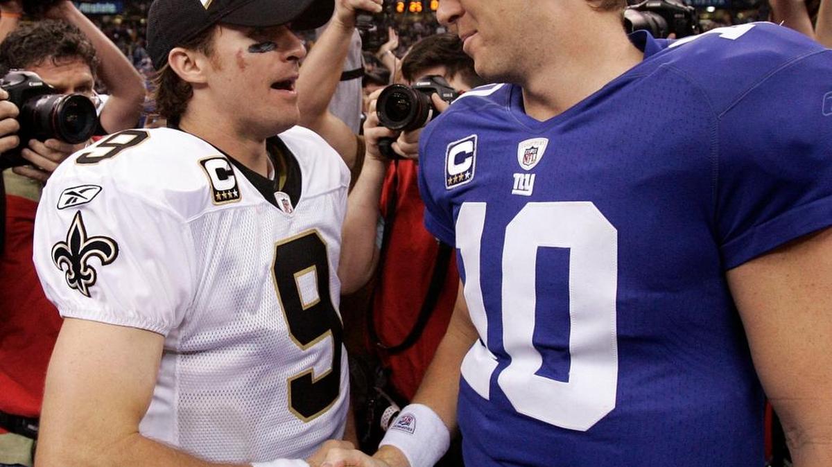 New Orleans Saints quarterback Drew Brees (9) and New York Giants quarterback Eli Manning (10) shake hands after an 2009 NFL football game in New Orleans. Brees and Manning are friends off the field and rivals on the field. On Sunday, the two high-profile quarterbacks go at it when Brees’ Saints take on Manning’s Giants.