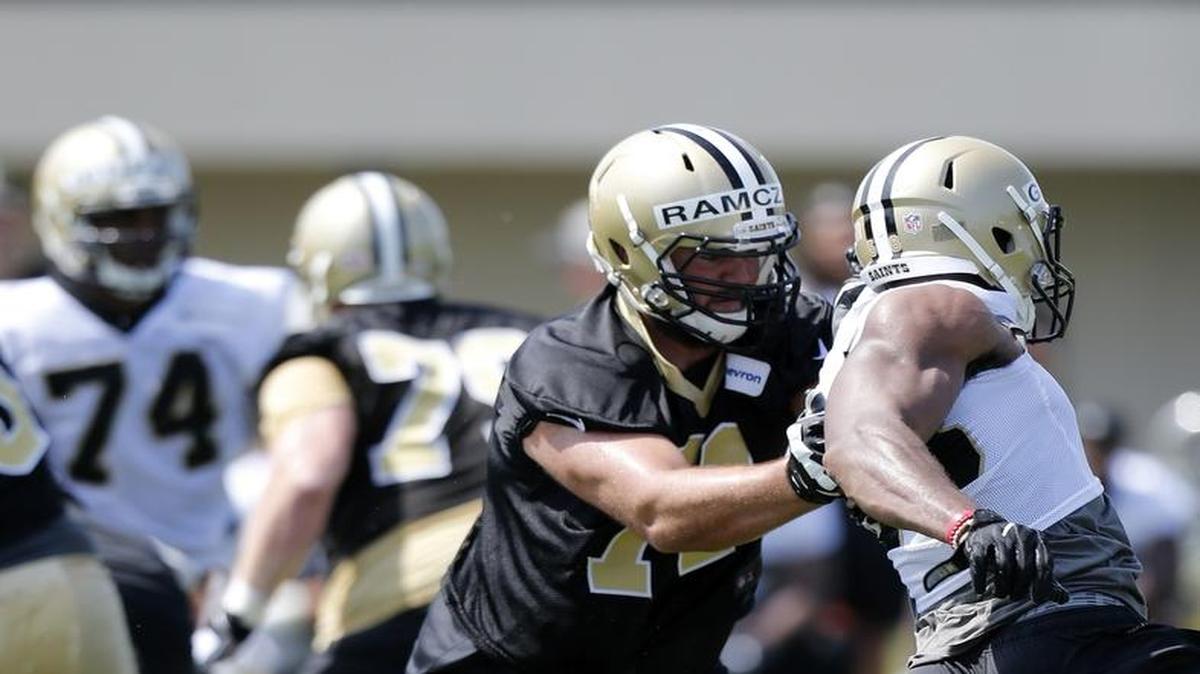 New Orleans Saints offensive tackle Ryan Ramczyk (71) runs through drills during an NFL football training camp in Metairie, La., Friday.