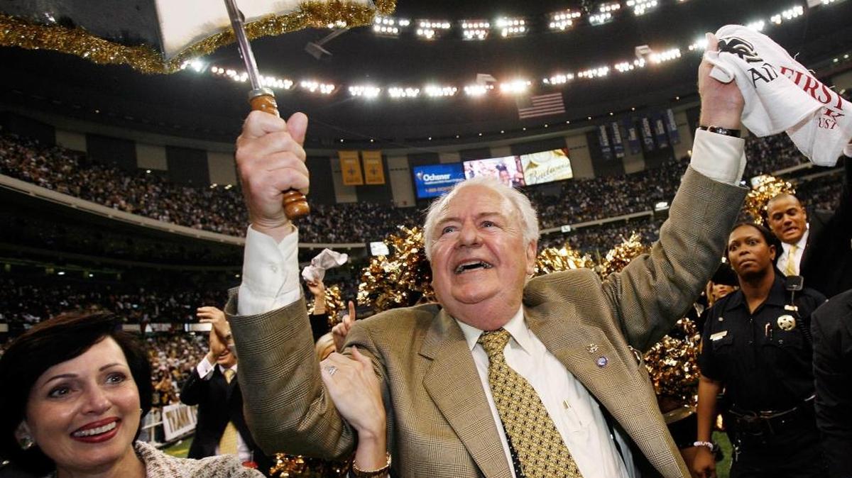 FILE - In this Sept. 25, 2006 file photo, New Orleans Saints owner Tom Benson dances with his wife Gayle Marie Benson after their football game with Atlanta Falcons at the newly re-opened Louisiana Superdome in New Orleans. The Saints won 23-3 The Superdome went from a candidate for demolition to a symbol of rebirth in the 13 months following Hurricane Katrina.