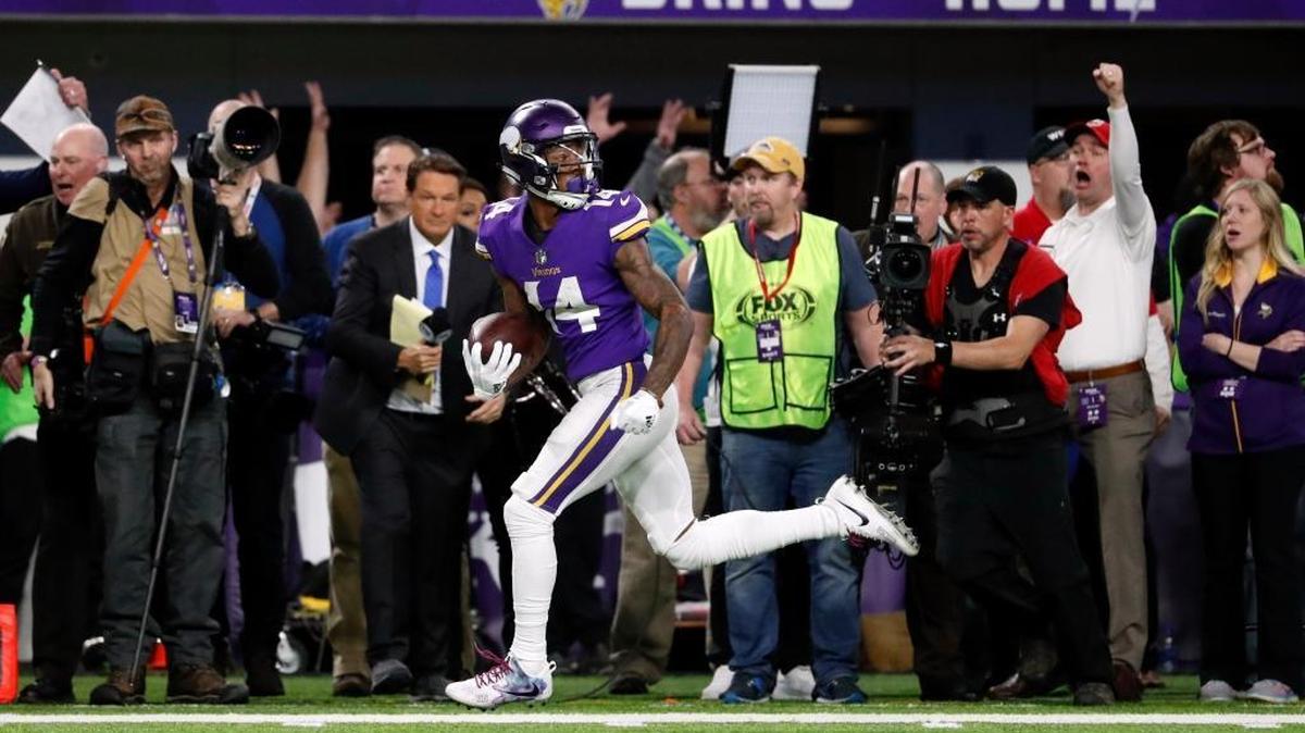Minnesota Vikings wide receiver Stefon Riggs (14) runs in for a game winning touchdown against the New Orleans Saints.
