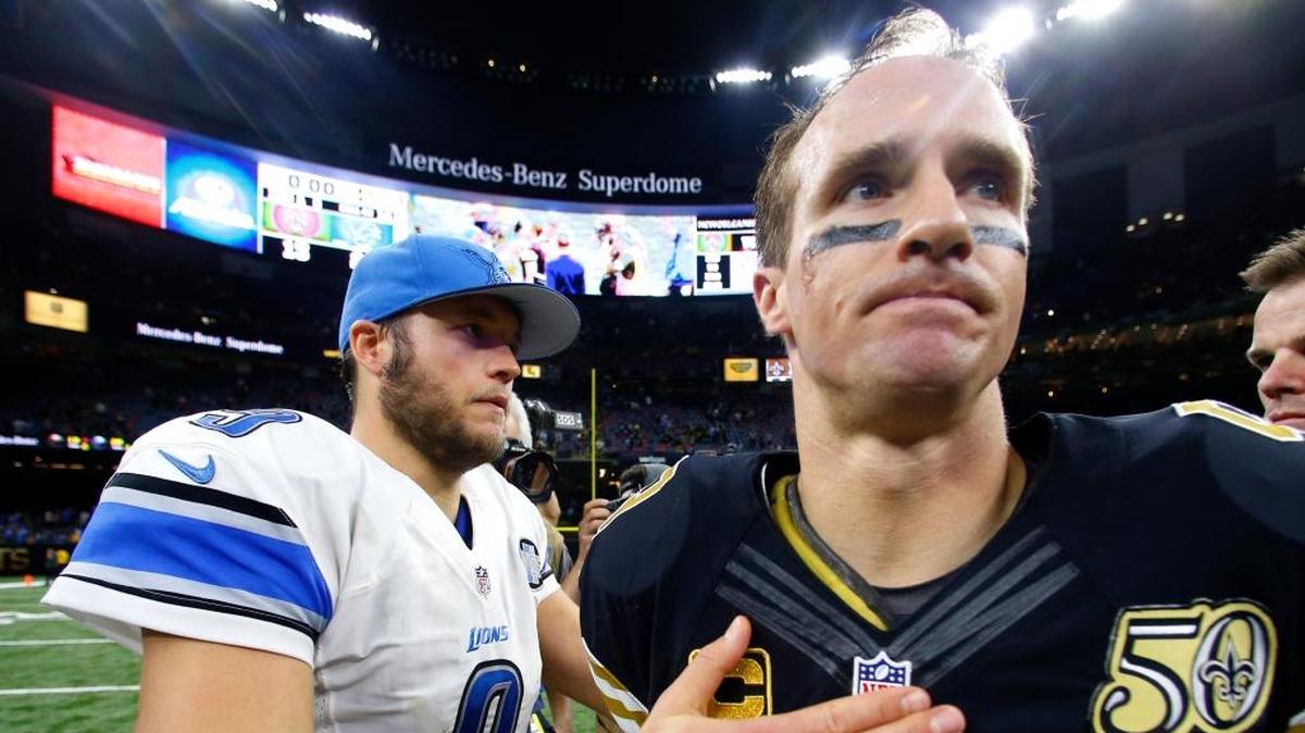 Detroit Lions quarterback Matthew Stafford (9), left, greets New Orleans Saints quarterback Drew Brees (9) last year in New Orleans. At 38 and in his final season under contract, Brees could make a statement about his longevity by outshining Matthew Stafford, who this year became the NFL’s highest-paid quarterback.