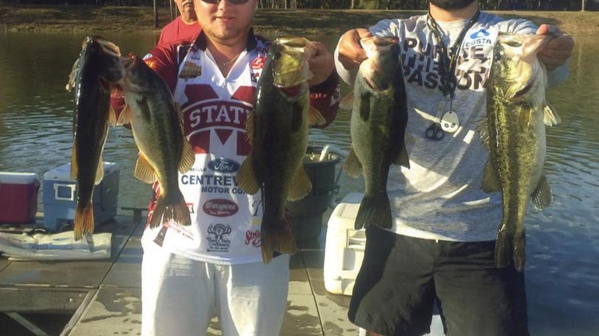 Mississippi State Bass Fishing Club members Caleb Hebert and Jack Stegall show off catches that earned them a second-place finish in the recent YETI FLW College Fishing Southeastern Conference bass tournament on Lake Seminole in Georgia.