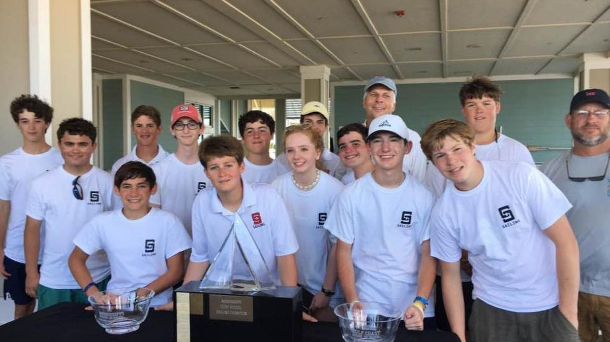 St. Stanislaus won its third straight state sailing championship. Team members are Joel Grumme, William Diaz, Eileen Masterson, JackWinstead, Morgan Blum, Frederick Cabel, Josh Grumme, Wallace St. Paul, William Baxter, Michael Burns, Graham Kalom, Charlie Breath, Coach Dan Zwerg, Thomas Duffy and Pro Racing Officer Steve Nolte.