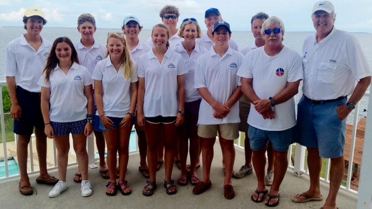 The Pass Christian Yacht Club won its second straight Junior Lipton Sailing Championship. Team members: Front Row (from left): Sofia Diaz del Valle, Mallory Edwards, Helen Charbonnet, coach Shelly McNair, William Weber, coach David Bolyard and coach John Dane III. Back row: Charles Breath, Michael Burns, Chris Luffey, Thomas Duffy, Thomas Weber and sailing director Ged Eustis.