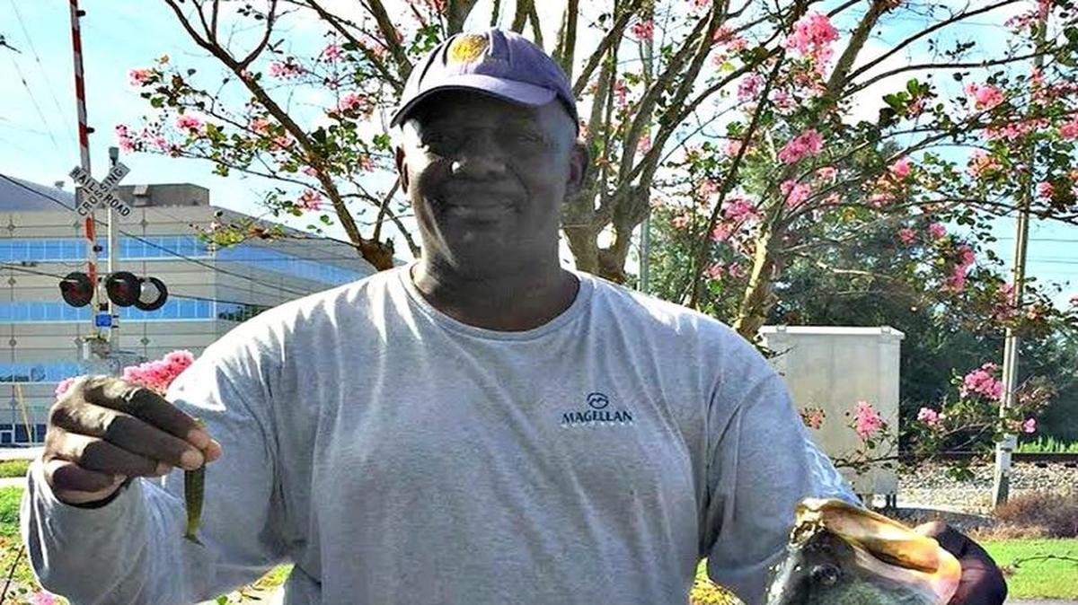 Bill Wright of Gulfport shows off a 9.5-pound largemouth bass he caught last month in Gulfport Lake.
