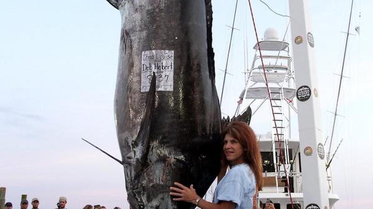 Angler Deb Hebert of the boat Iona Louise takes a picture with her blue marlin, weighing in at 843.7 pounds, during the 17th Mississippi Gulf Coast Billfish Classic in 2014. The Billfish Conservation Act’s legislation was clarified to include the Pacific Billfish.