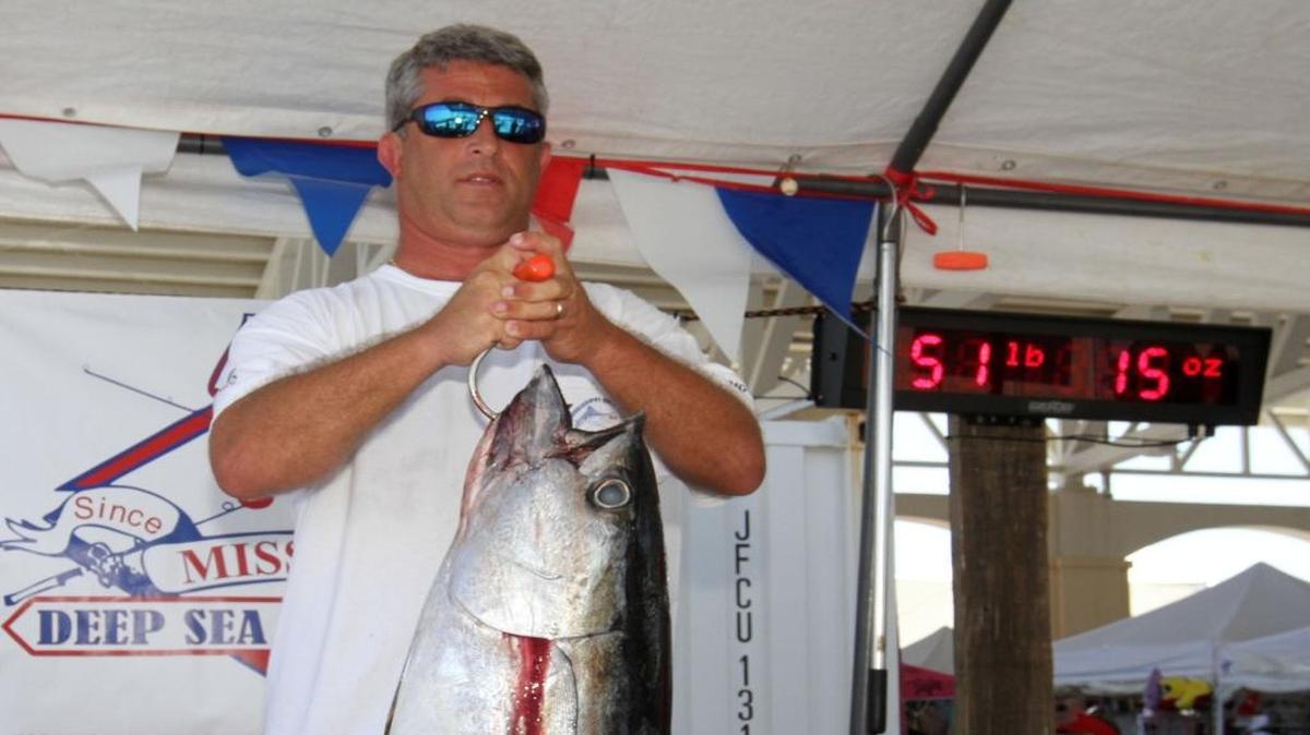 Elmer Pique of Gulfport holds his first-place winner — a 51-pound, 15-ounce yellowfin tuna during the final day of the Mississippi Deep Sea Fishing Rodeo in 2016.