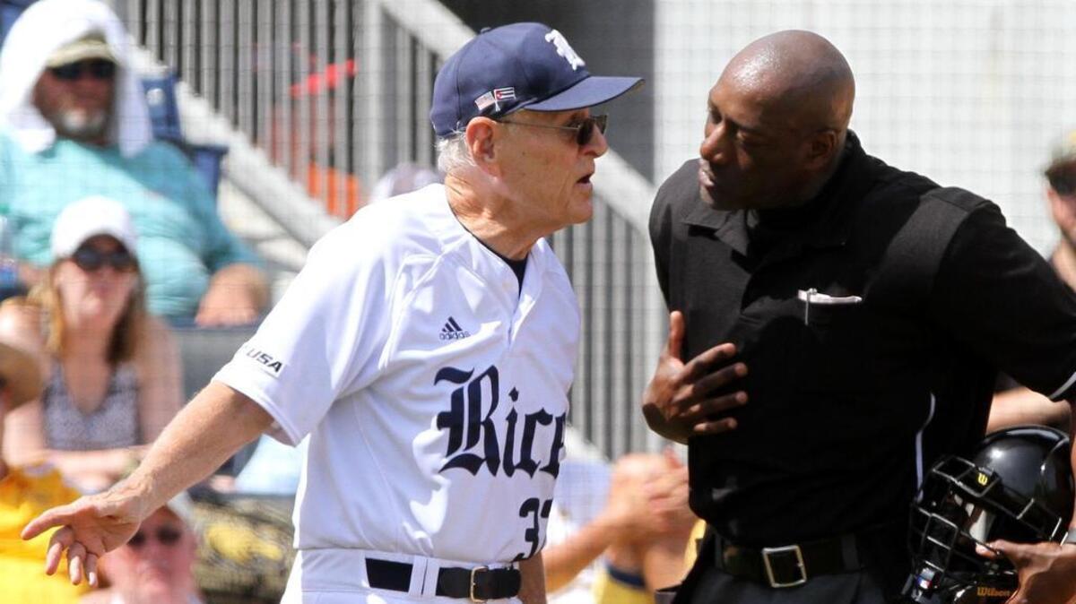Rice head coach Wayne Graham argues a called strike with home plate umpire Linus Baker during the fifth inning of the C-USA tournament championship game at MGM Park in Biloxi on Sunday, May 28, 2017.