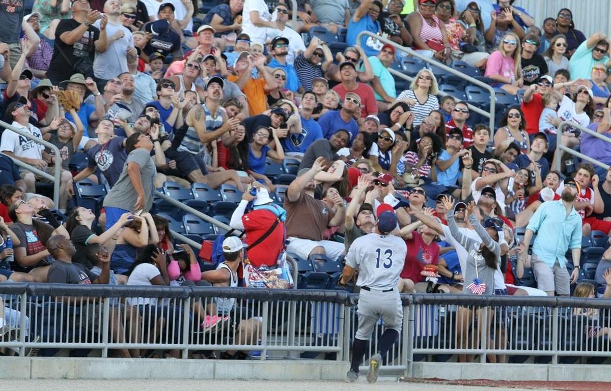 Fans reach for a foul ball during the second inning of the Biloxi Shuckers game against Pensacola at MGM Park in Biloxi on July 4. Photographer’s comment: This is a fun photo to look at all the different expressions of the fans’ faces as they either reach for the ball hopefully or duck for cover.