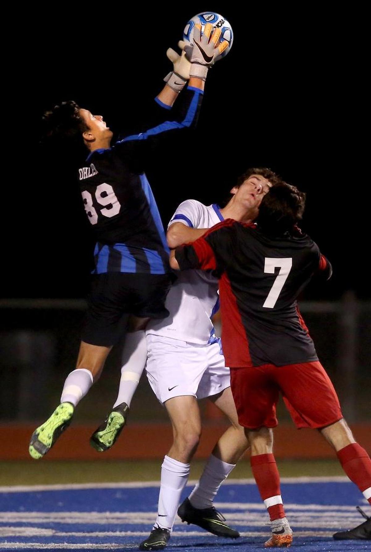 Ocean Springs goalie Moses Ohler snags the ball from above the heads of teammate Mike Martin and Biloxi’s Nicolas Mateus during the 6A playoffs on Jan. 24 at Ocean Springs. Photographer’s comments: I always love while I’m shooting soccer when I can capture a great save by the keeper, which might be obvious because this is my second such photo in my favorites from 2017.