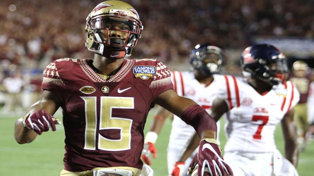 Florida State's Travis Rudolph (#15) scores FSU's first touchdown against Ole Miss at Camping World Stadium in Orlando, Fla., on Monday.