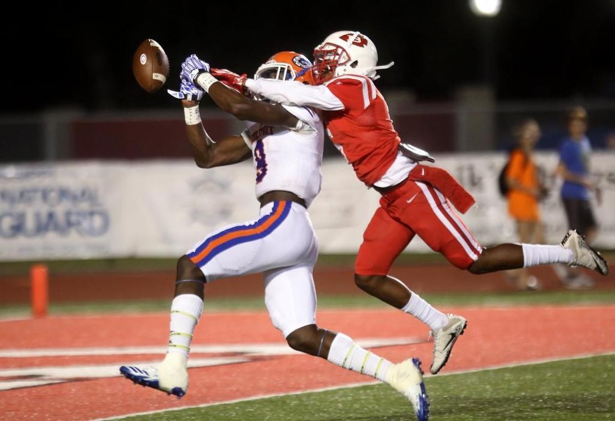 Biloxi corner back Riko Carter breaks up a pass intended for Gulfport wide receiver Derick Hall on Nov. 3 at Biloxi High. Photographer’s comments: My favorite football photos to shoot are the wide receiver and cornerback struggling for a catch. This one was composed perfectly to see both players with the ball just out of their reach.