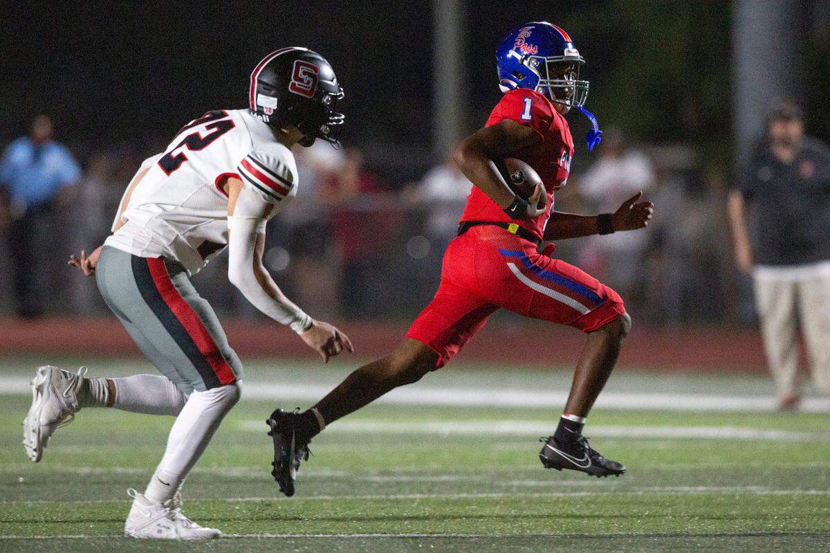 Pass Christian’s Paris Trivillion runs the ball during a game between Pass Christian and St. Stanislaus at Francis McDonald Stadium in Pass Christian on Friday, Sept. 20, 2024.