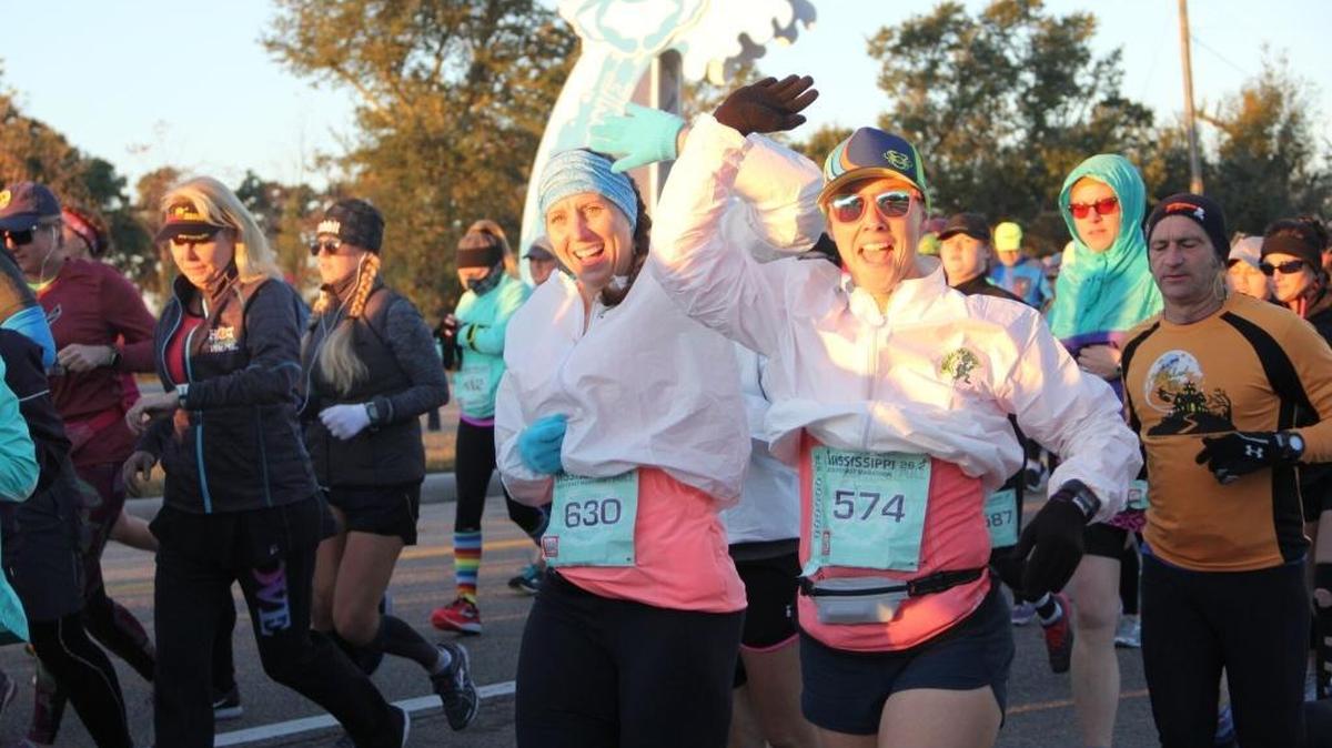 Runners compete in the Mississippi Gulf Coast Marathon Sunday.