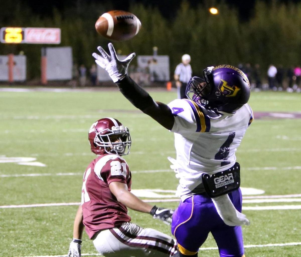 Picayune cornerback Curdevone Jackson watches as Hattiesburg wide receiver D’andre Humbles makes a one-handed catch during the second quarter of their game at Lee-Triplett Stadium in Picayune on Oct. 20. Photographer’s comment: I had several shots like this, and this is the the best, since he actually made the catch.