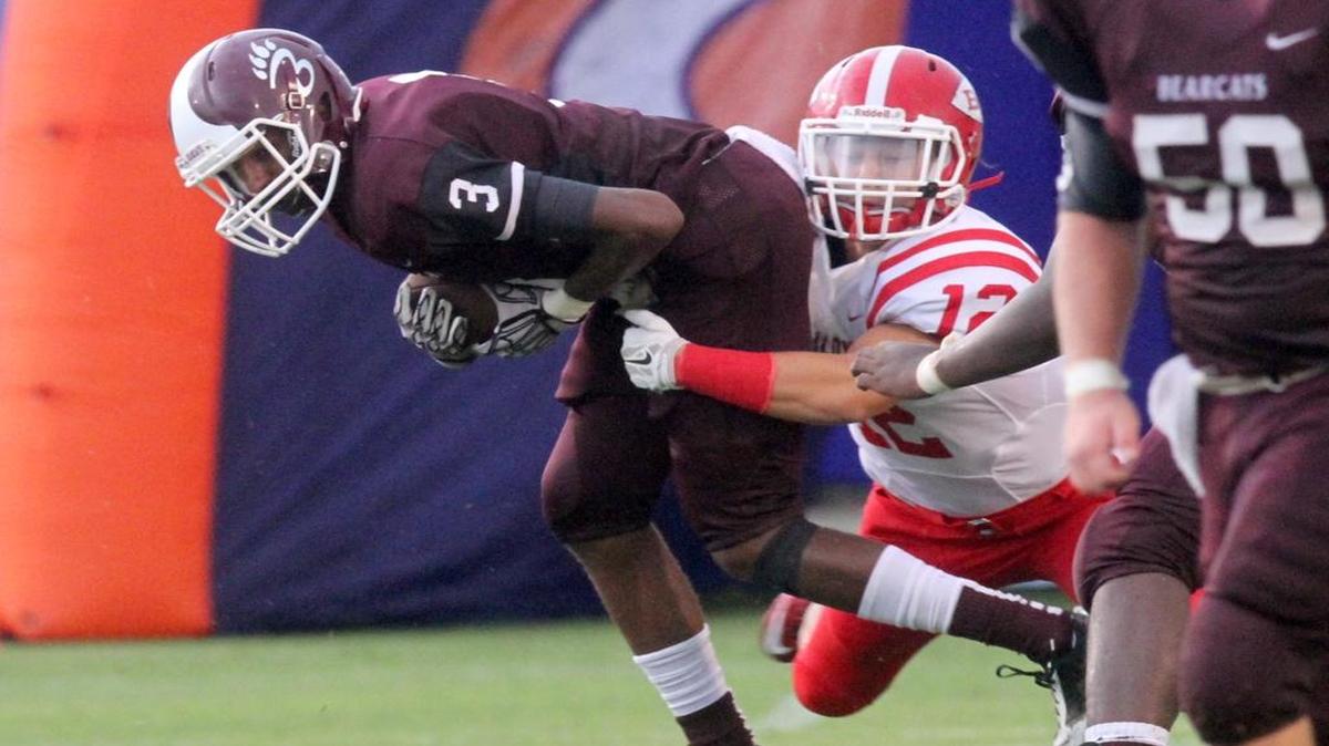 Long Beach receiver Trevor Terry is tackled by a Biloxi defender during the 2015 Shrimp Bowl game at Milner Stadium in Gulfport. Terry, now at Jones County Junior College, landed an offer from Southern Miss over the weekend.