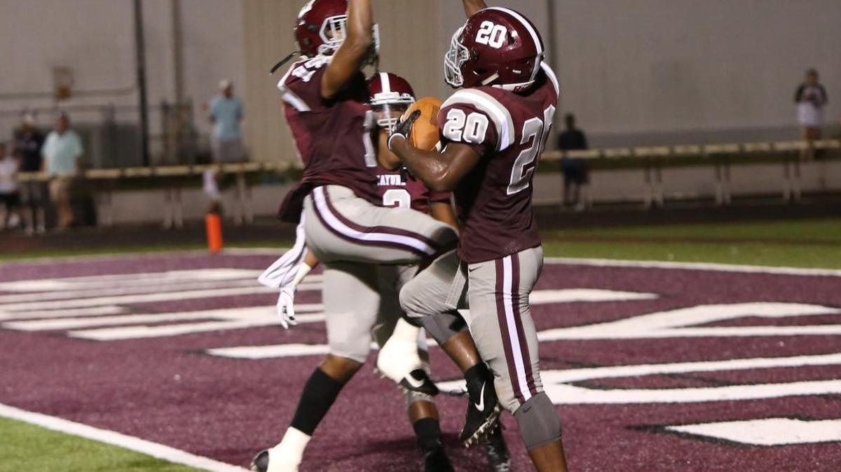 Picayune running back Shaun Anderson, right, and wide receiver V.J. Holt celebrate Anderson's third touchdown against D'Ibervilletheir game at Lee/Triplett Stadium in Picayune on Aug. 25.