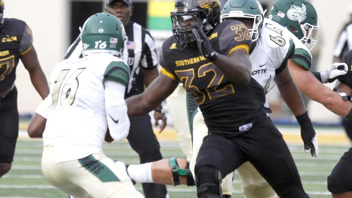 Southern Miss defensive end Xavier Thigpen sacks Charlotte quarterback Hasaan Kluge at M. M. Roberts Stadium in Hattiesburg on Nov. 5.