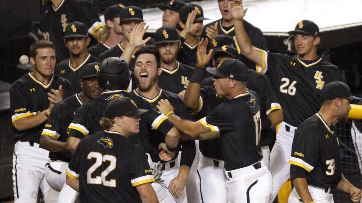 Dylan Burdeaux and the Southern Miss Golden Eagles celebrate after Daniel Keating scored against Mississippi State during Hattiesburg Regional Tournament Monday at Pete Taylor Park.