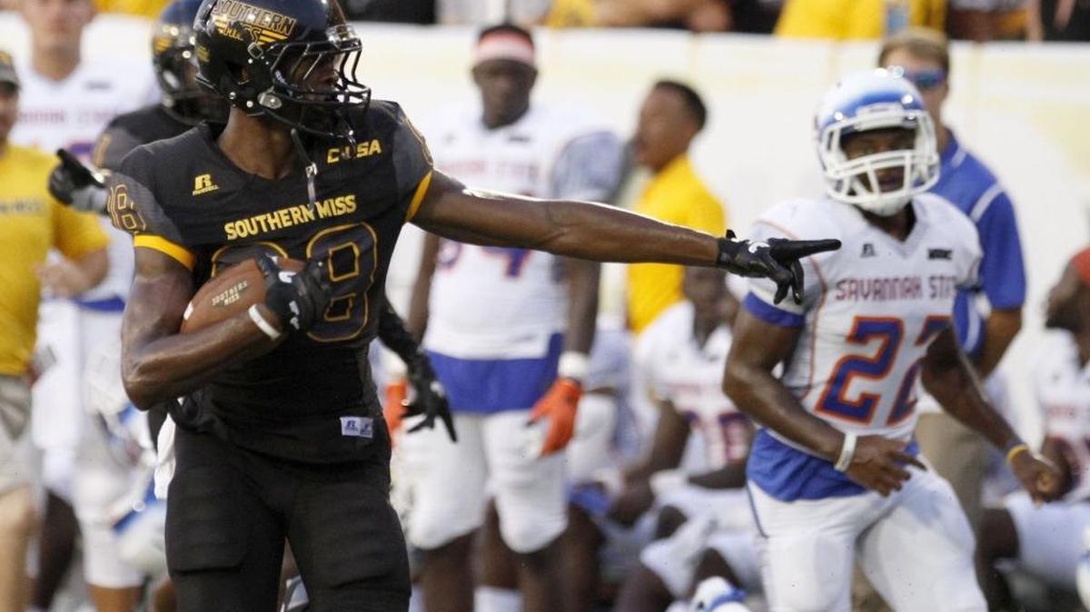 Southern Miss receiver Isaiah Jones points out a Savannah State defender after making a cut back to the middle of the field on Sept. 10, 2016, in Hattiesburg.