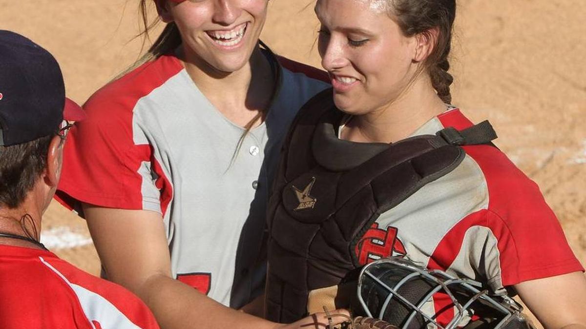 Harrison Central pitcher Kristen Cade greets her sister and catcher, Kayla Cade, after striking out the side in the third inning of their 6A South State softball playoff game against St. Martin on May 7, 2016, in Lyman. The Cades will form one of the better pitcher-catcher combinations in South Mississippi this season.