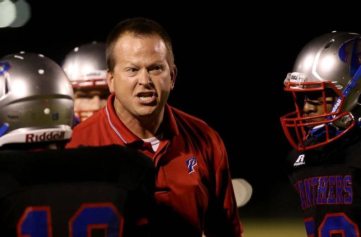 Pascagoula coach Lewis Sims yells at his team after they failed to stop the kick from crossing the goal line against Picayune on Friday, October 30, 2015, at Pascagoula High.