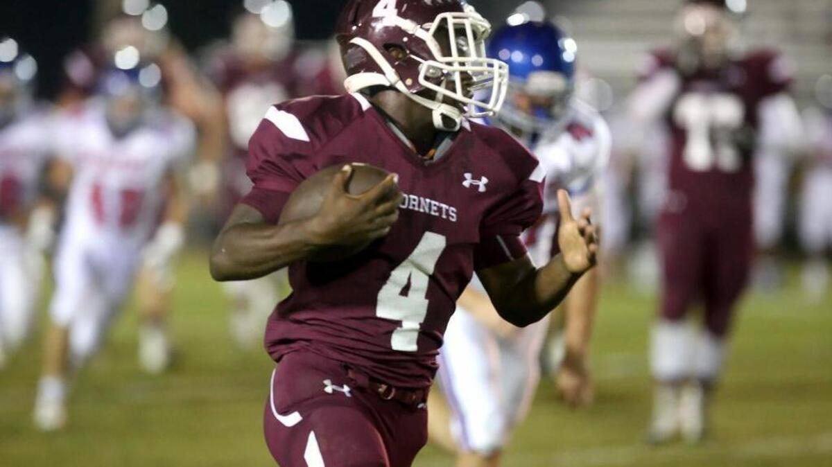 East Central's Tony Brown runs the ball against Pass Christian on Oct. 7, 2016.