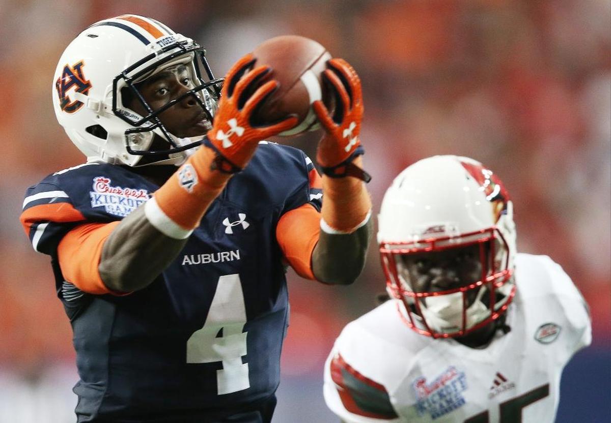 Former Mississippi Gulf Coast Community College quarterback Jason Smith (4) has found a role at Auburn as a reliable receiver.