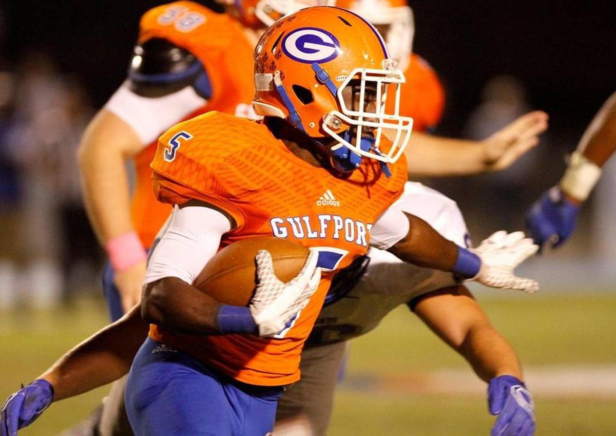 Gulfport running back Larozzo Shugart looks for running room against Ocean Spring, Friday, Oct. 30, 2015.
