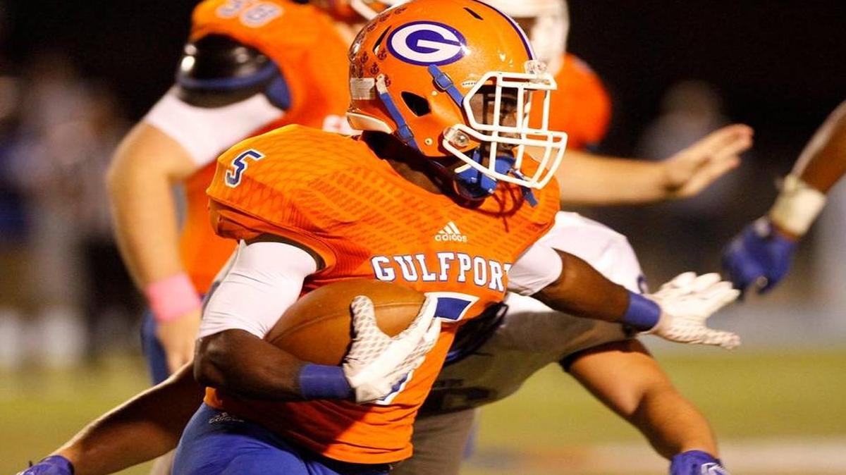Gulfport running back Larozzo Shugart looks for running room against Ocean Spring, Friday, Oct. 30, 2015.