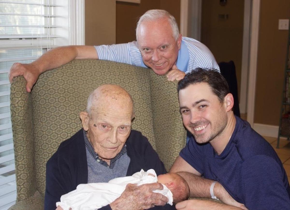 Four generations of Ochs, as Harrison, left, and Monte, top, meet their great granddaughter and granddaughter, Alexandria Grace Ochs.