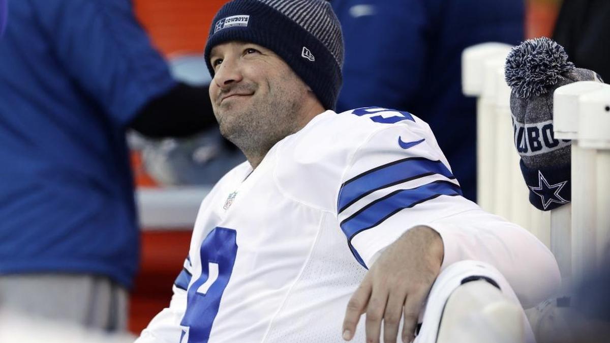 FILE - In this Jan. 1, 2017, file photo, Dallas Cowboys' Tony Romo smiles on the bench during the second half of an NFL football game against the Philadelphia Eagles in Philadelphia. A person with knowledge of the decision says Romo is retiring rather than trying to chase a Super Bowl with another team after losing his starting job with the Dallas Cowboys. The all-time passing leader for the storied franchise is headed to the broadcast booth after considering those offers.