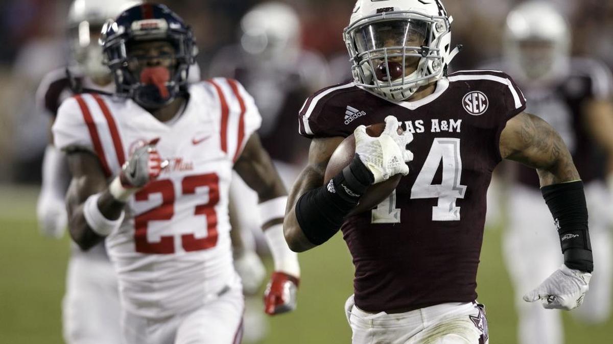 Texas A&M defensive back Justin Evans (14) runs a kickoff 90 yards against Ole Miss, Nov. 12, in College Station, Texas. Evans recently accepted an invitation to play in the annual Senior Bowl, played in Mobile, Alabama.