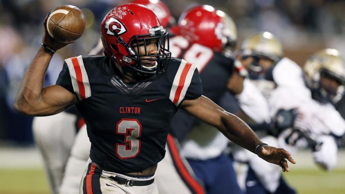 Clinton's quarterback Cam Akers sets up to pass against Pearl in the MHSAA Class 6A football championship game in Starkville, Friday, Dec. 2, 2016.
