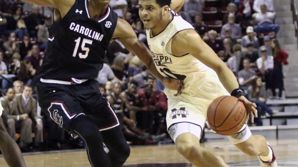 Mississippi State guard Quinndary Weatherspoon (11) drives against South Carolina guard PJ Dozier (15) in Starkville, Feb. 11.
