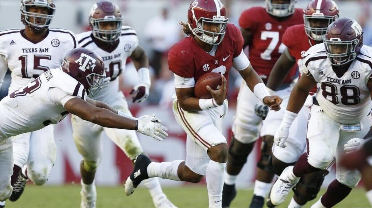 Alabama quarterback Jalen Hurts runs the ball in for a touchdown against Texas A&M, Oct. 22, 2016, in Tuscaloosa, Ala. The Crimson Tide enter the 2017 season as the easy pick to win the SEC.