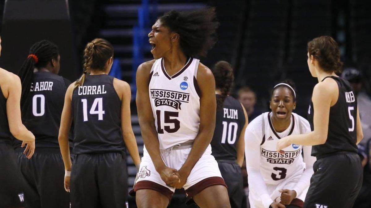 Mississippi State center Teaira McCowan (15) celebrates during the second half of a regional semifinal against Washington in the NCAA women's college basketball tournament, Friday, March 24, 2017, in Oklahoma City.