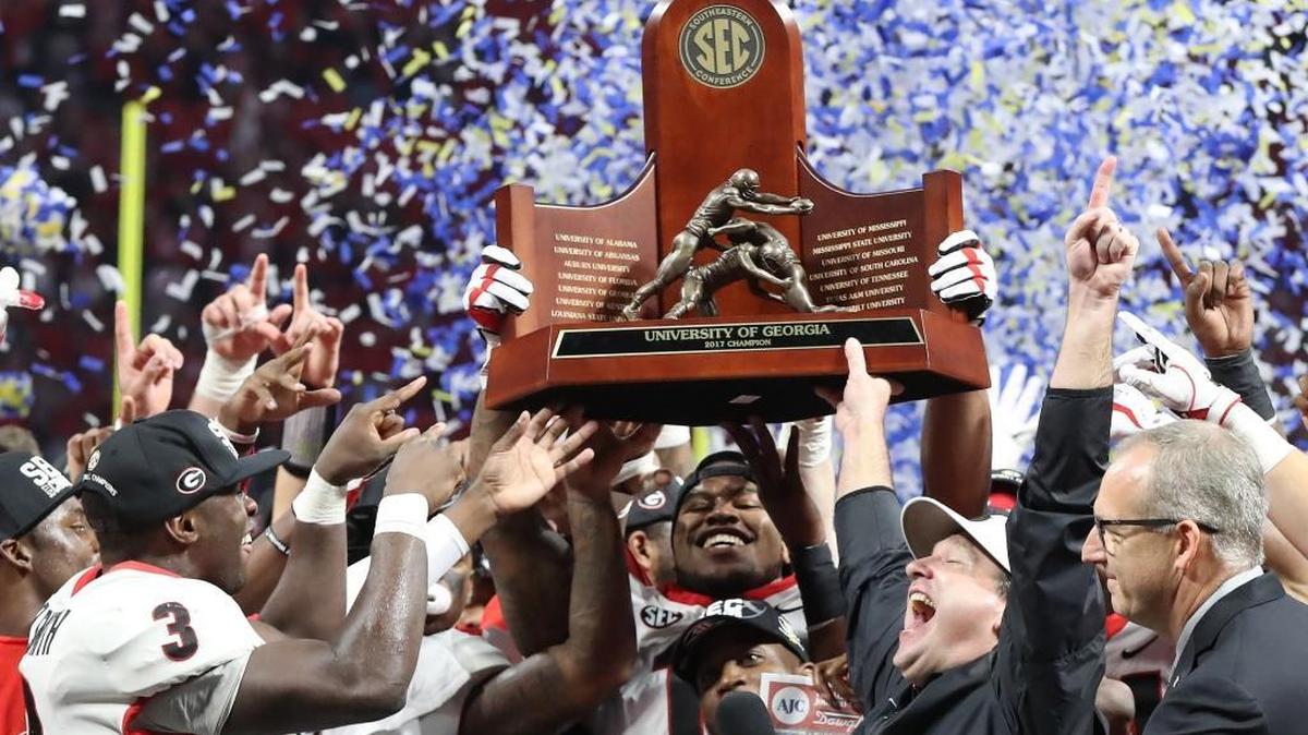 Georgia Bulldogs linebacker Roquan Smith (3), head coach Kirby Smart, and Georgia teammates celebrate after defeating the Auburn Tigers 28-7 during the SEC Football Championship at Mercedes-Benz Stadium, Dec. 2, 2017, in Atlanta. Did you know the SEC was once headquartered in Mississippi?